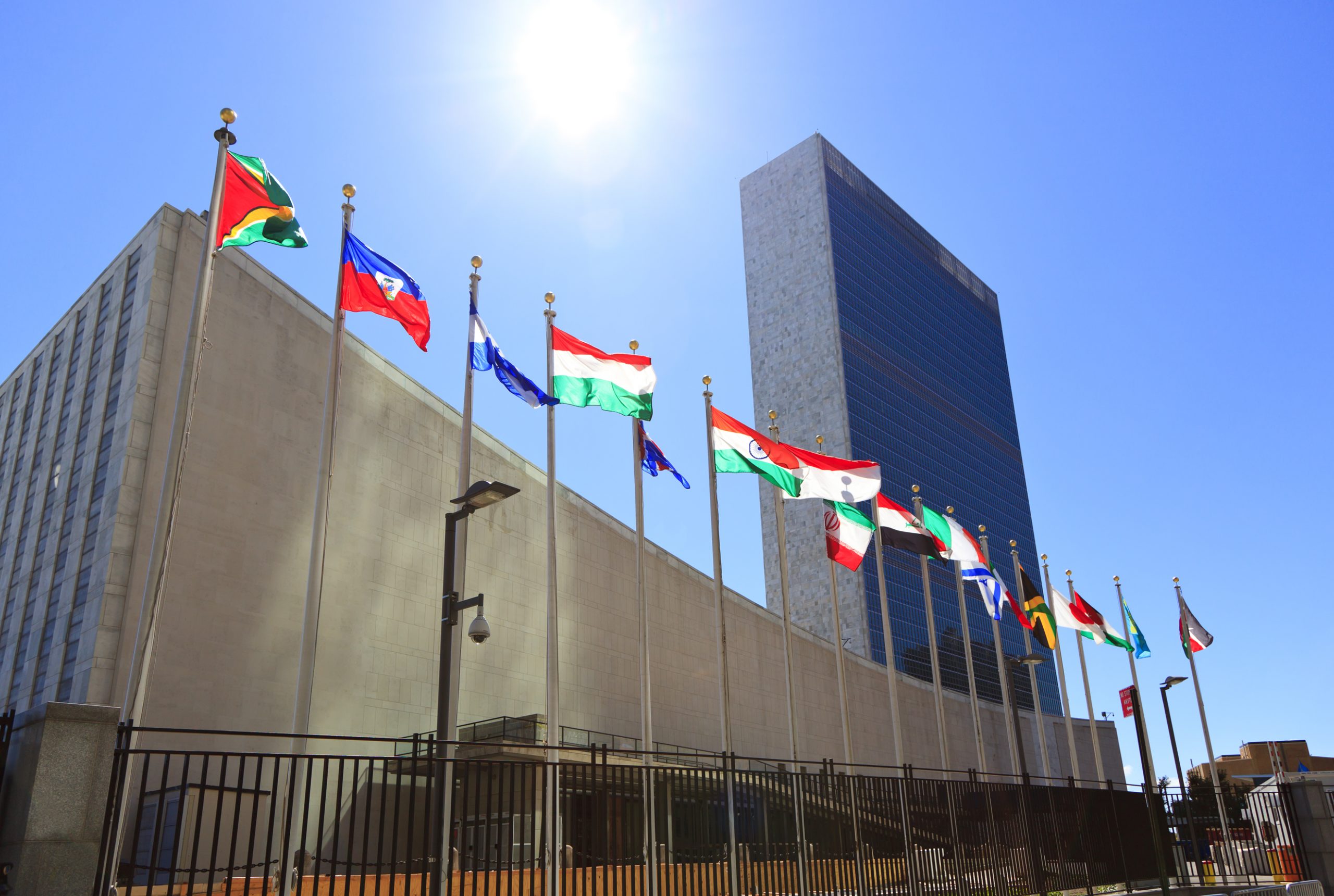 Outside the UN building in New York flags fly